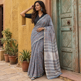 Blue Sanganeri hand block print Kota Doria cotton saree by artisan Purushottam Chhipa, draped and worn by a woman, AI visual of the saree, iTokri