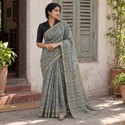 Grey blue Sanganeri hand block print Kota Doria cotton saree by artisan Purushottam Chhipa, draped and worn by a woman, AI visual of the saree, iTokri