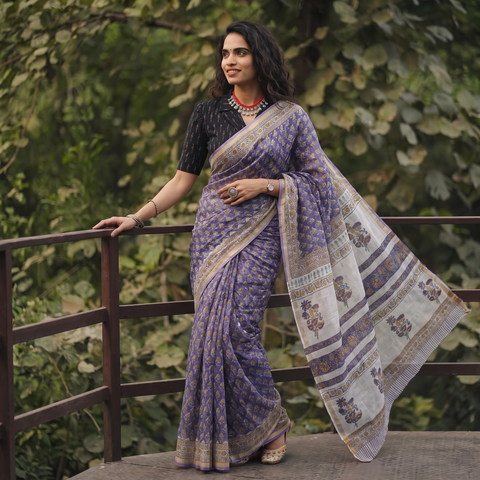 Purple Sanganeri hand block print Kota Doria cotton saree by artisan Purushottam Chhipa, draped and worn by a woman, AI visual of the saree, iTokri