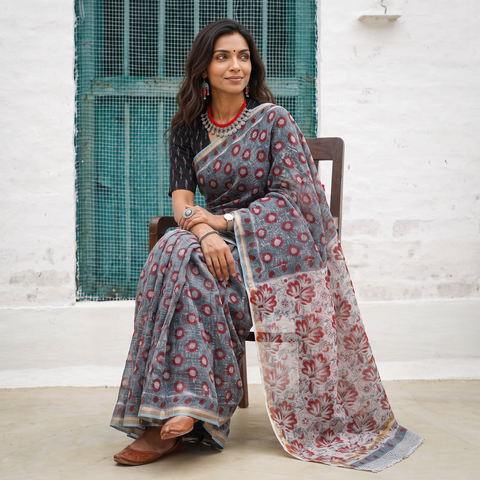 Grey and red Sanganeri hand block print Kota Doria cotton saree by artisan Purushottam Chhipa, draped and worn by a woman, AI visual of the saree, iTokri