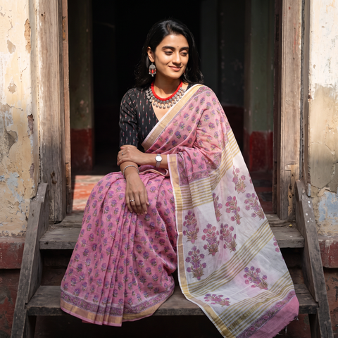 Pink Sanganeri hand block print Kota Doria cotton saree by artisan Purushottam Chhipa, draped and worn by a woman, AI visual of the saree, iTokri