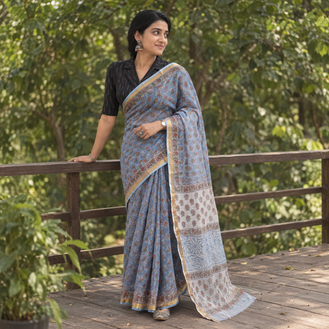 Blue grey Sanganeri hand block print Kota Doria cotton saree by artisan Purushottam Chhipa, draped and worn by a woman, AI visual of the saree, iTokri