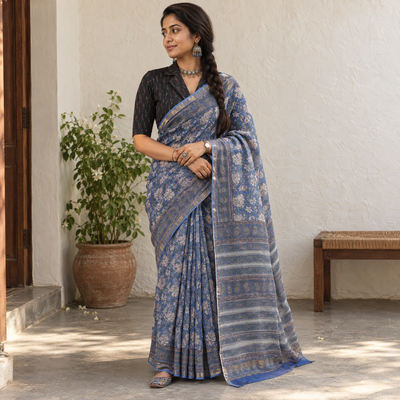 Blue Sanganeri hand block print Kota Doria cotton saree by artisan Purushottam Chhipa, draped and worn by a woman, AI visual of the saree, iTokri