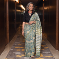 Green Sanganeri Hand Block Print Modal Silk Saree, draped and worn by a woman, AI visual of the saree, iTokri