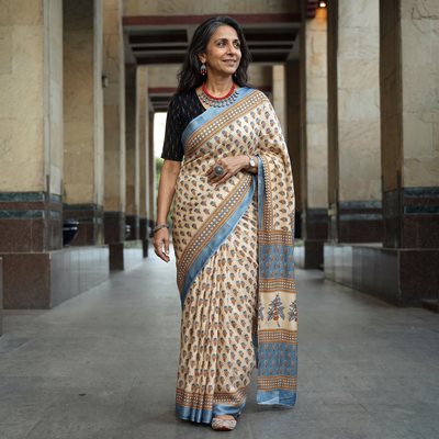 Beige Sanganeri Hand Block Print Modal Silk Saree, draped and worn by a woman, AI visual of the saree, iTokri