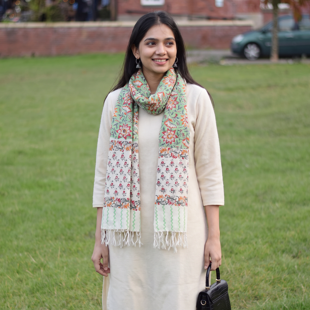 Green Sanganeri Hand Block Print Pure Merino Wool Handwoven Stole, worn by a woman, AI visual of the stole, iTokri