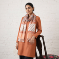 Orange Sanganeri Hand Block Print Pure Merino Wool Handwoven Stole, worn by a woman, AI visual of the stole, iTokri