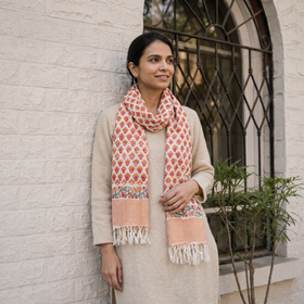 Orange Sanganeri Hand Block Print Pure Merino Wool Handwoven Stole, worn by a woman, AI visual of the stole, iTokri