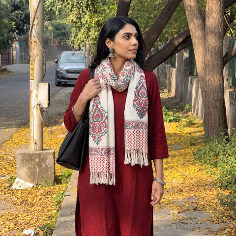 Pink Sanganeri Hand Block Print Pure Merino Wool Handwoven Stole, worn by a woman, AI visual of the stole, iTokri