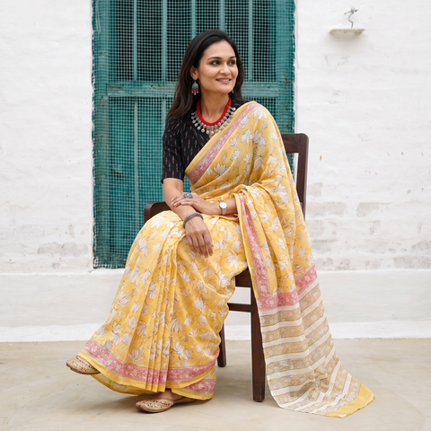 Yellow Sanganeri hand block print pure mul cotton ready to wear saree, draped and worn by a woman, AI visual of the saree, iTokri