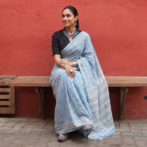 Light blue Sanganeri hand block print pure mul cotton ready to wear saree, draped and worn by a woman, AI visual of the saree, iTokri