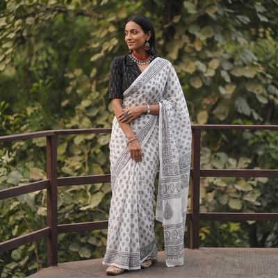 White and black Sanganeri hand block print pure mul cotton ready to wear saree, draped and worn by a woman, AI visual of the saree, iTokri