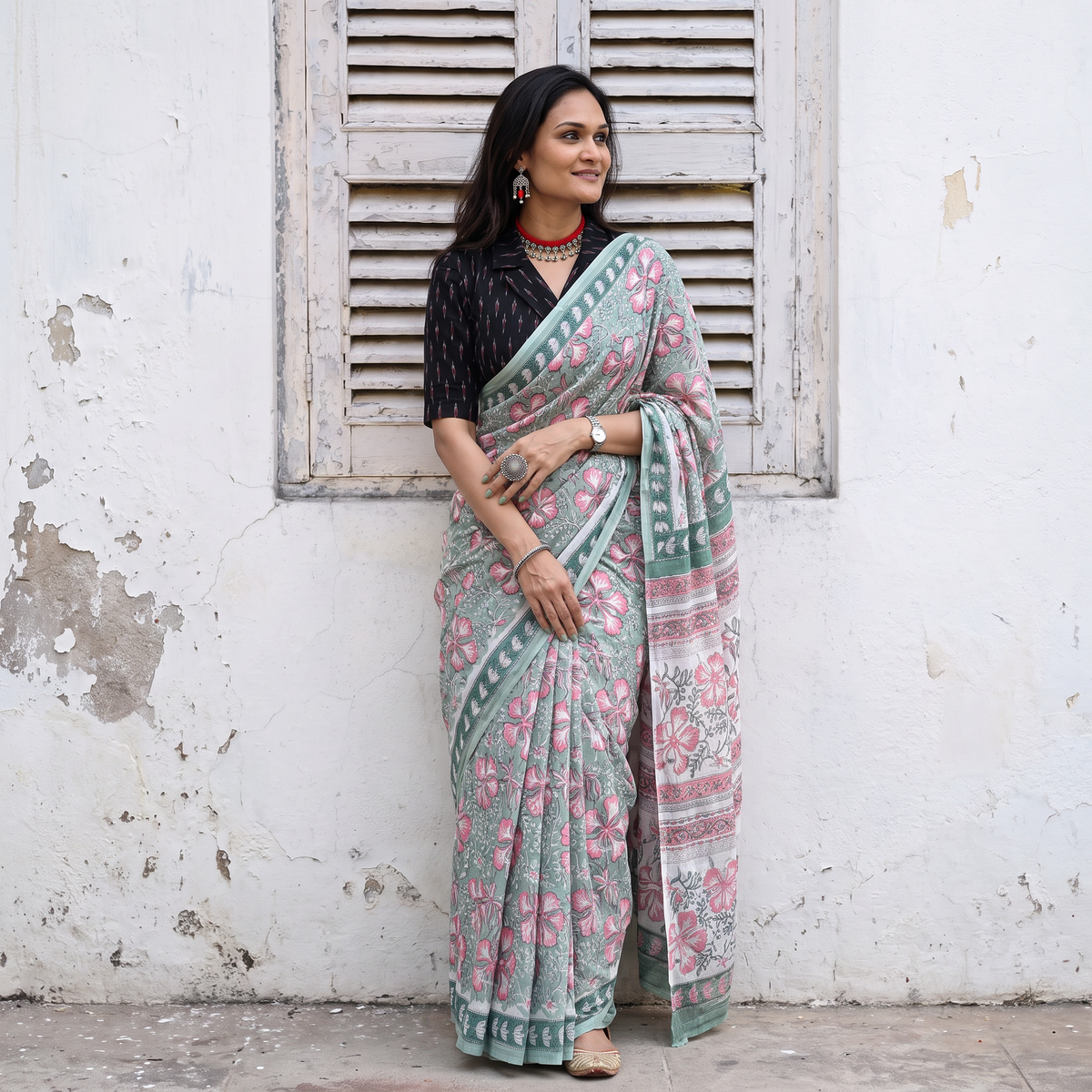 Mint green and pink Sanganeri hand block print pure mul cotton ready to wear saree, draped and worn by a woman, AI visual of the saree, iTokri