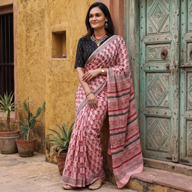 Pink and red Sanganeri hand block print pure mul cotton ready to wear saree, draped and worn by a woman, AI visual of the saree, iTokri