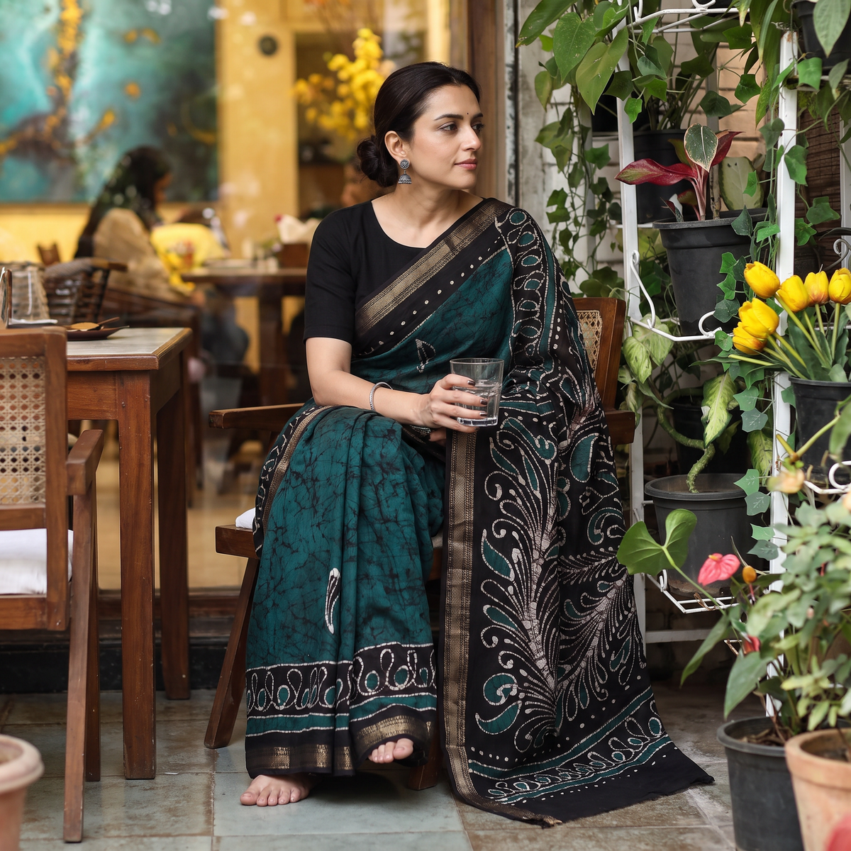 Green Silk Cotton Hand Batik Print Saree with Blouse, draped and worn by a woman, AI visual of the saree, iTokri