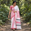 Pink and White Silk Cotton Thread Buti Assam Pure Handwoven Saree, draped and worn by a woman, AI visual of the saree, iTokri