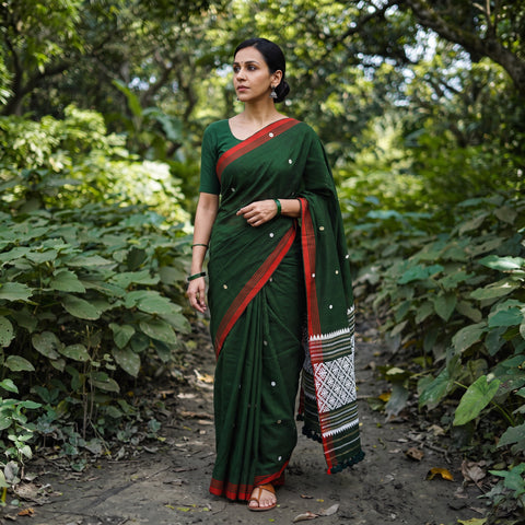 Bottle Green Silk Cotton Thread Buti Assam Pure Handwoven Saree with Blouse Piece, draped and worn by a woman, AI visual of the saree, iTokri
