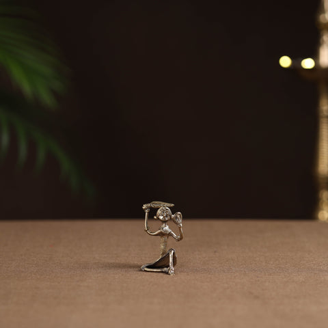 Sitting lady with combing hair tribal odisha dokra art