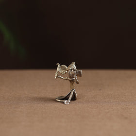 Sitting lady with reading book tribal odisha dokra art