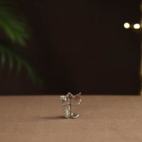 Sitting lady with reading book tribal odisha dokra art