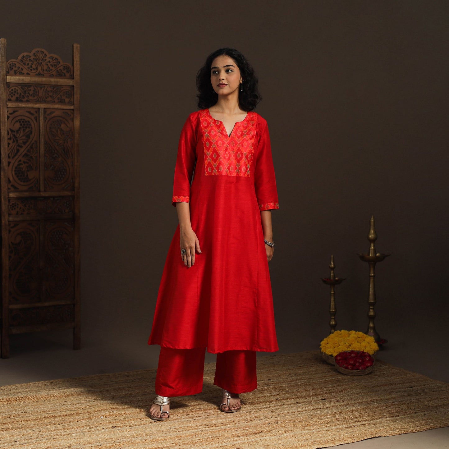 Slub silk a-line plain kurta with ikat patch 09