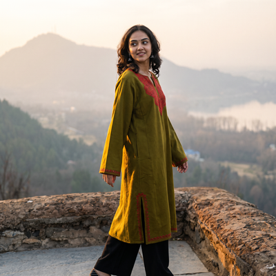 Green Sozni Hand Embroidered Kashmiri Merino Wool Pheran, worn by a model, AI visual of the pheran, iTokri