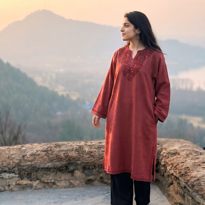 Red Sozni Hand Embroidered Kashmiri Merino Wool Pheran, worn by a model, AI visual of the pheran, iTokri