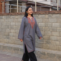 Grey Sozni Hand Embroidered Kashmiri Merino Wool Pheran, worn by a model, AI visual of the pheran, iTokri