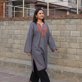 Grey Sozni Hand Embroidered Kashmiri Merino Wool Pheran, worn by a model, AI visual of the pheran, iTokri