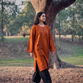 Red Sozni Hand Embroidered Kashmiri Merino Wool Pheran, worn by a model, AI visual of the pheran, iTokri