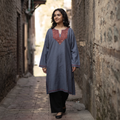Blue Sozni Hand Embroidered Kashmiri Merino Wool Pheran, worn by a model, AI visual of the pheran, iTokri
