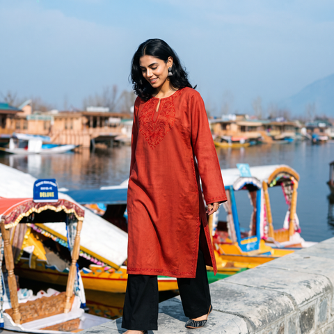 Red Sozni Hand Embroidered Kashmiri Merino Wool Pheran, worn by a model, AI visual of the pheran, iTokri