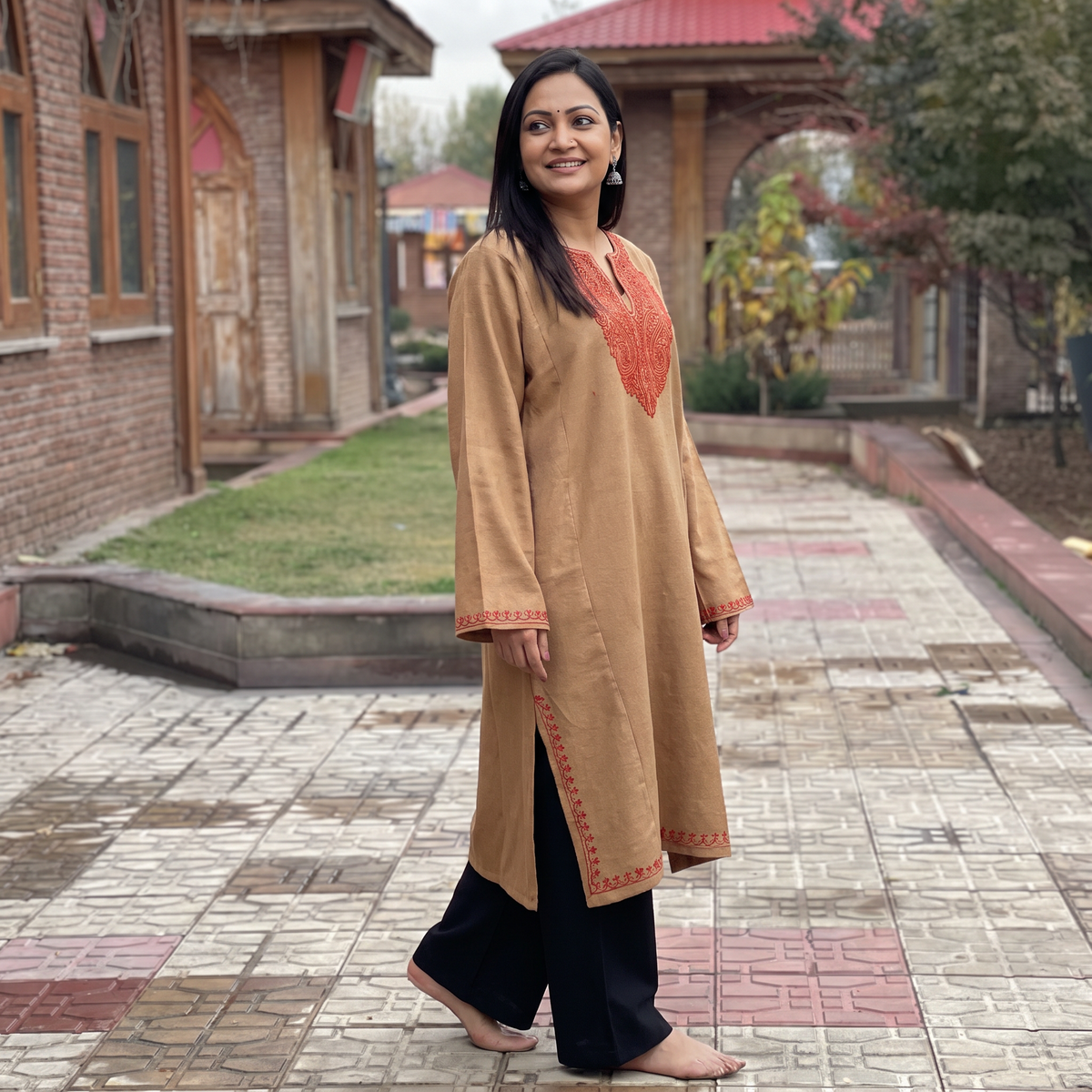 Brown Sozni Hand Embroidered Kashmiri Merino Wool Pheran, worn by a model, AI visual of the pheran, iTokri