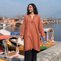 Brown Sozni Hand Embroidered Kashmiri Merino Wool Pheran, worn by a model, AI visual of the pheran, iTokri
