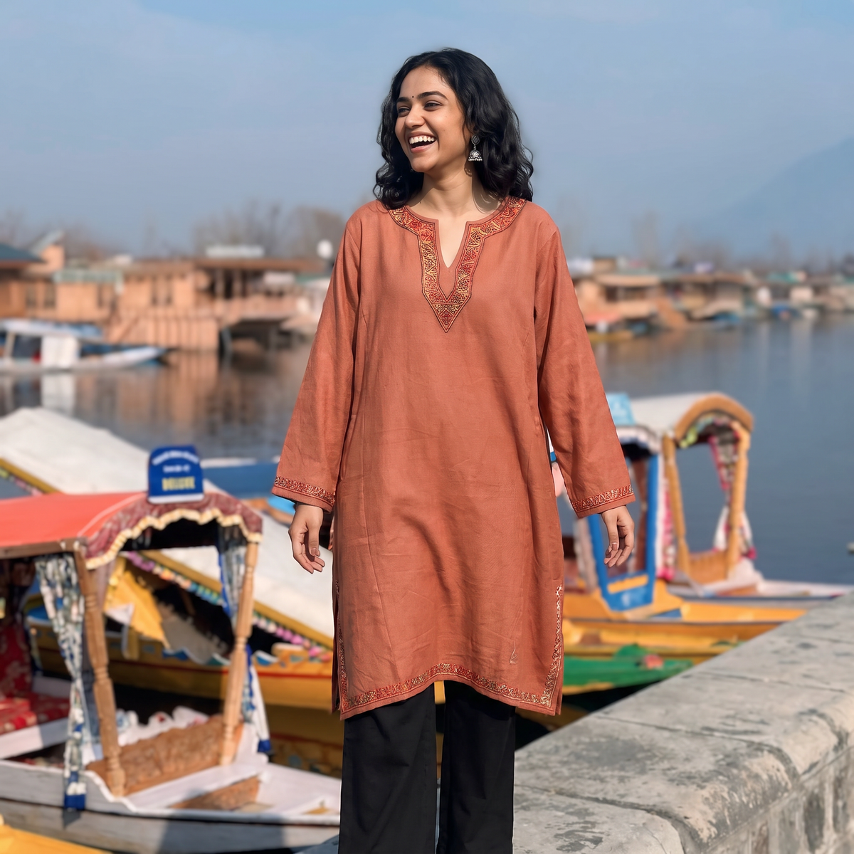 Brown Sozni Hand Embroidered Kashmiri Merino Wool Pheran, worn by a model, AI visual of the pheran, iTokri