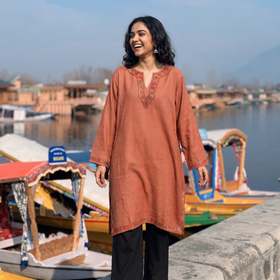 Brown Sozni Hand Embroidered Kashmiri Merino Wool Pheran, worn by a model, AI visual of the pheran, iTokri