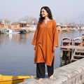 Orange Sozni Hand Embroidered Kashmiri Merino Wool Pheran, worn by a model, AI visual of the pheran, iTokri