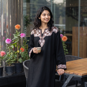 Black Sozni Hand Embroidered Kashmiri Merino Wool Pheran, worn by a model, AI visual of the pheran, iTokri
