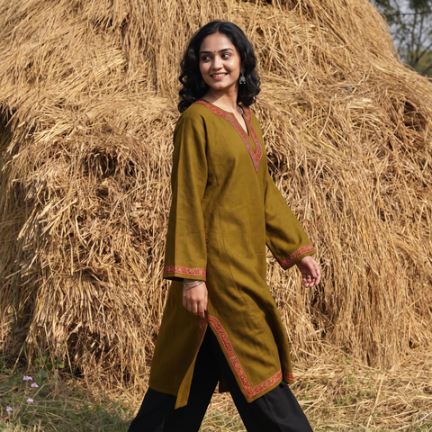 Brown Sozni Hand Embroidered Kashmiri Merino Wool Pheran, worn by a model, AI visual of the pheran, iTokri