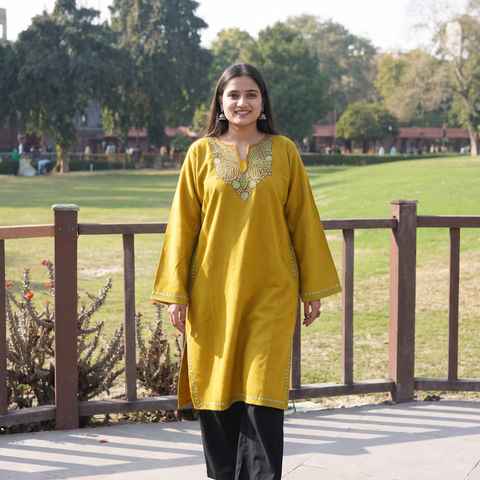 Yellow Sozni Hand Embroidered Kashmiri Merino Wool Pheran, worn by a model, AI visual of the pheran, iTokri