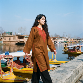 Brown Sozni Hand Embroidered Kashmiri Merino Wool Pheran, worn by a model, AI visual of the pheran, iTokri