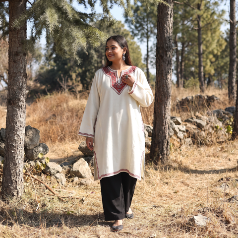 White Sozni Hand Embroidered Kashmiri Merino Wool Pheran, worn by a model, AI visual of the pheran, iTokri