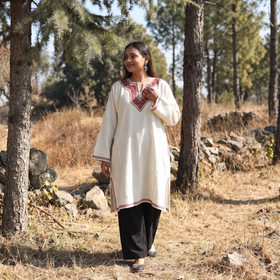 White Sozni Hand Embroidered Kashmiri Merino Wool Pheran, worn by a model, AI visual of the pheran, iTokri