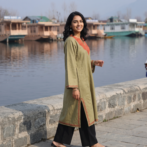 Green Sozni Hand Embroidered Kashmiri Merino Wool Pheran, worn by a model, AI visual of the pheran, iTokri