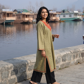 Green Sozni Hand Embroidered Kashmiri Merino Wool Pheran, worn by a model, AI visual of the pheran, iTokri