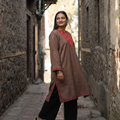 Brown Sozni Hand Embroidered Kashmiri Merino Wool Pheran, worn by a model, AI visual of the pheran, iTokri