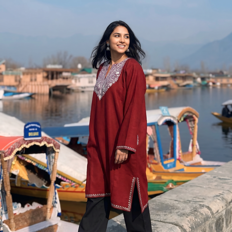 Maroon Sozni Hand Embroidered Kashmiri Merino Wool Pheran, worn by a model, AI visual of the pheran, iTokri