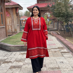 Red Sozni Zari Work Hand Embroidery Kashmiri Merino Wool Pheran, worn by a model, AI visual of the pheran, iTokri