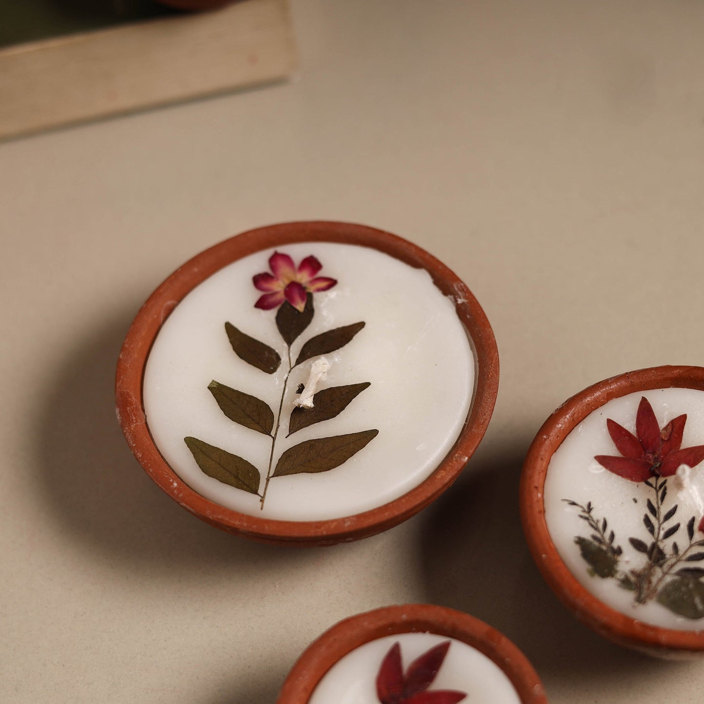 Sri aurobindo ashram clay diya with wax (set of 3) 01