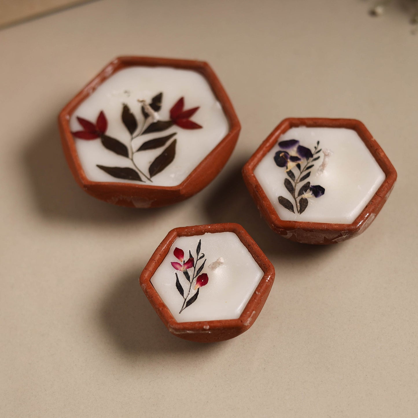 Sri aurobindo ashram clay diya with wax (set of 3) 03